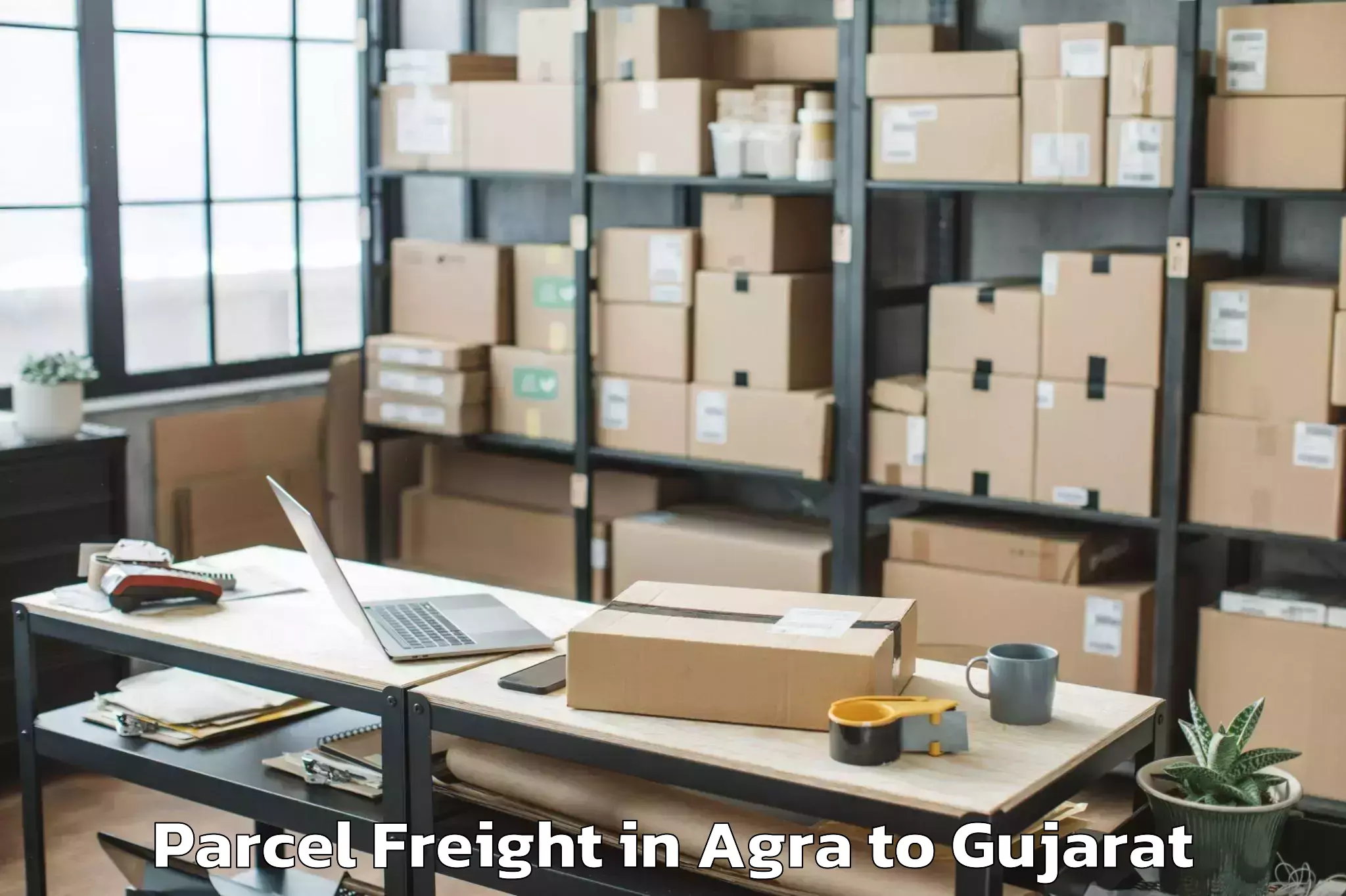 Discover Agra to Damnagar Parcel Freight